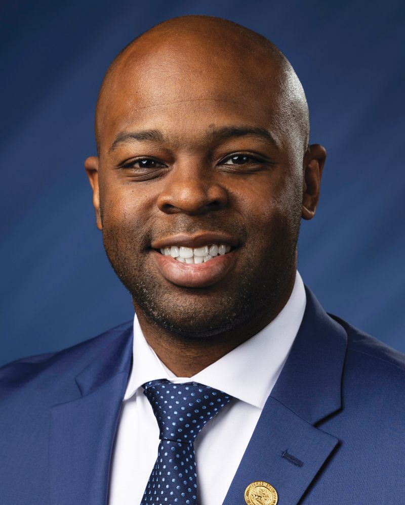 Alex Burton — Democratic State Representative for Indiana District 77 (official headshot) Alex Burton — Democratic State Representative for Indiana District 77 (official headshot)